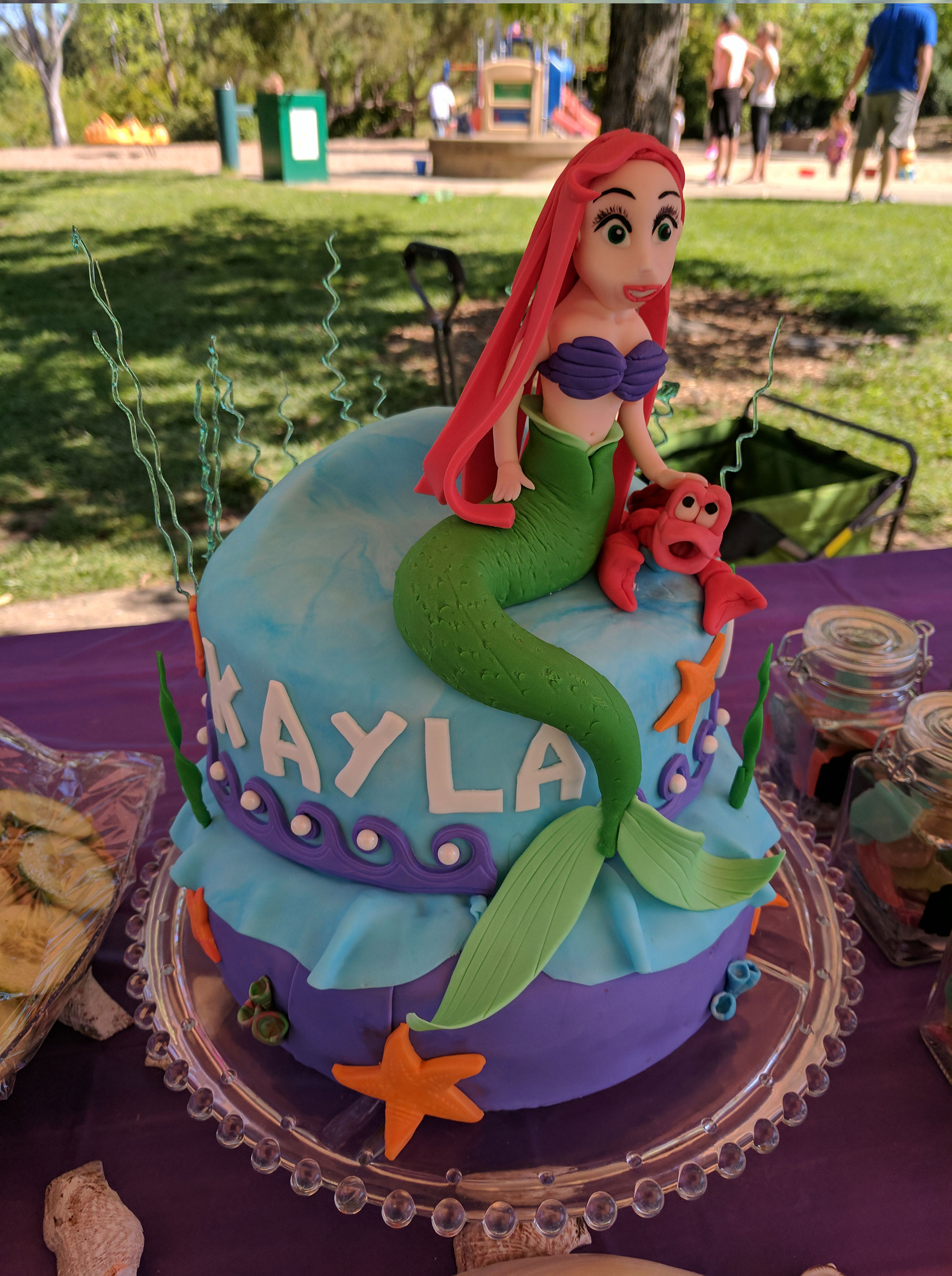 birthday cake showing a mermaid and a crab